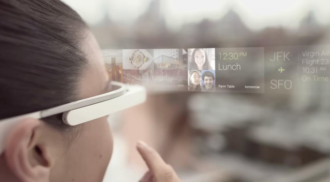 A woman wearing smart glasses with a translucent display showing notifications for lunch, nearby places, and a flight.