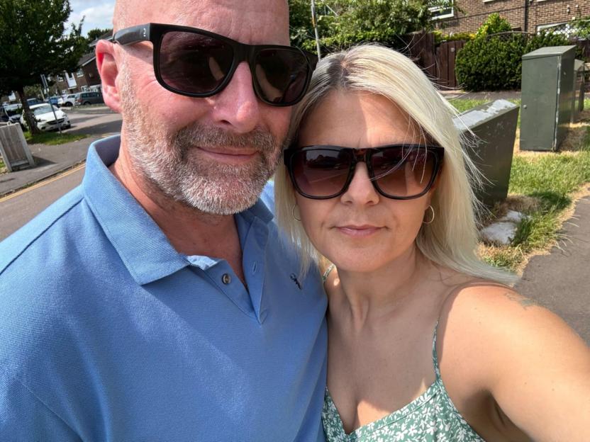 Couple wearing sunglasses.