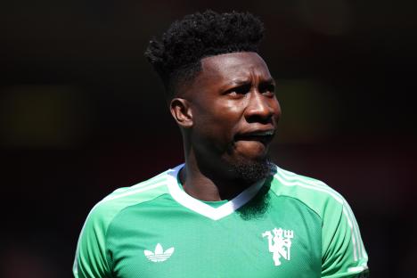 Andre Onana, Manchester United goalkeeper, in a green jersey.