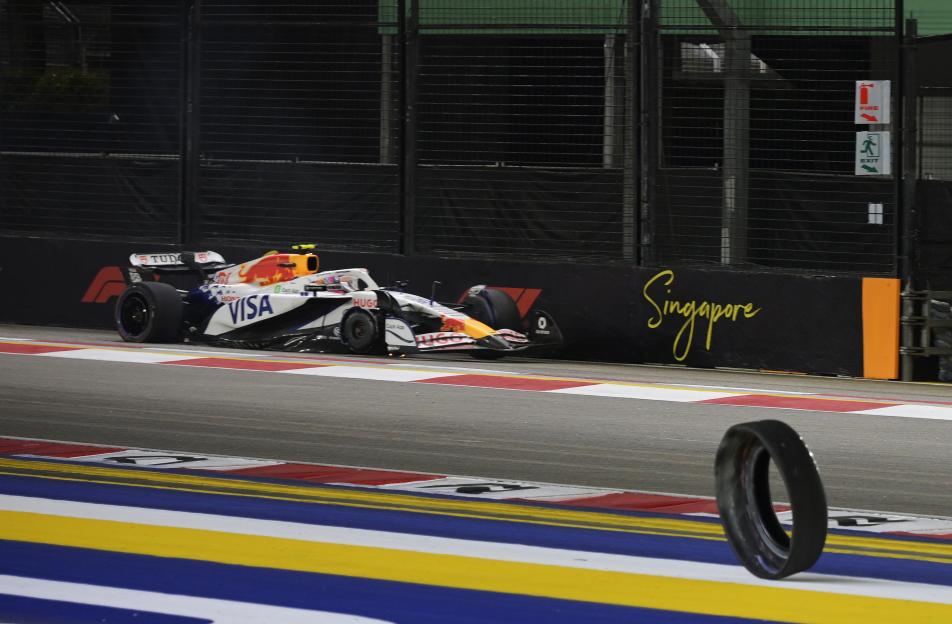 RB driver Liam Lawson crashes into a barrier and loses a tire during a free practice session for the Formula One Singapore Grand Prix.