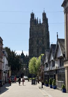 Wrexham town center with St. Giles' Church in the background.