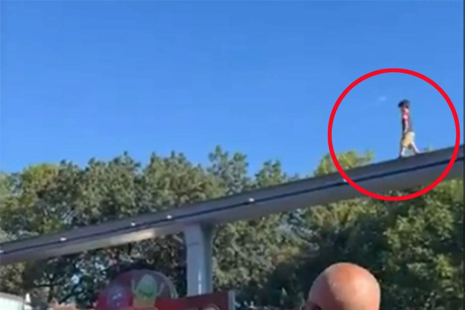 Heart-stopping video shows missing child found walking alone on top of 100ft monorail track at popular park