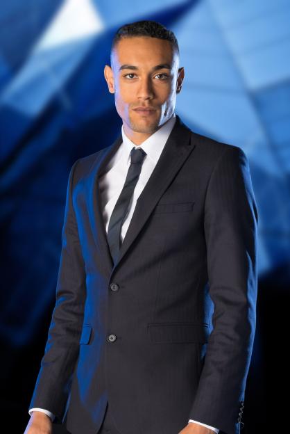 Scott Saunders, candidate on the BBC programme The Apprentice, in a suit.