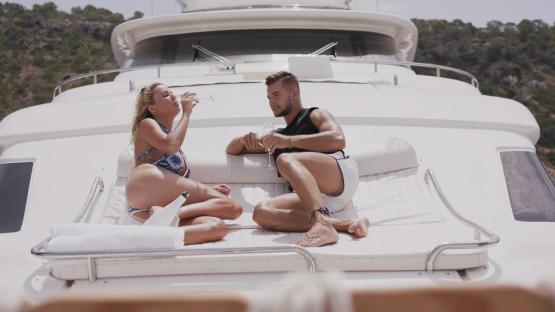 Olivia Attwood and Chris Hughes on a yacht date.