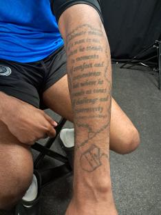 Addai's arm tattoo of Martin Luther King Jr.'s