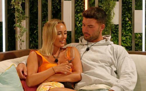 Millie Court and Liam Reardon from Love Island sharing a drink.