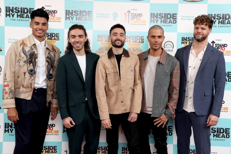 Max George, Siva Kaneswaran, Jay McGuiness, Tom Parker, and Nathan Sykes of The Wanted posing at "Inside My Head - The Concert" photocall.