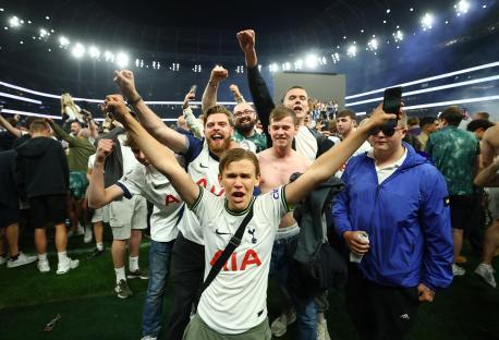Tottenham Hotspur fans celebrating a victory.