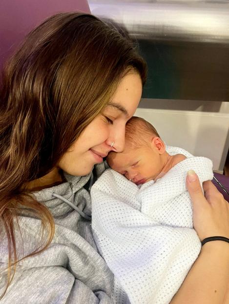 Megan Isherwood holds baby Jackson while in the hospital.