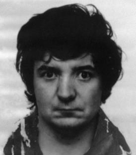 Black and white mugshot of Peter Sullivan.
