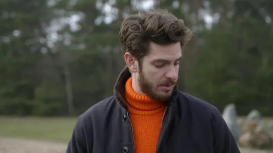 Andrew Garfield appearing emotional.