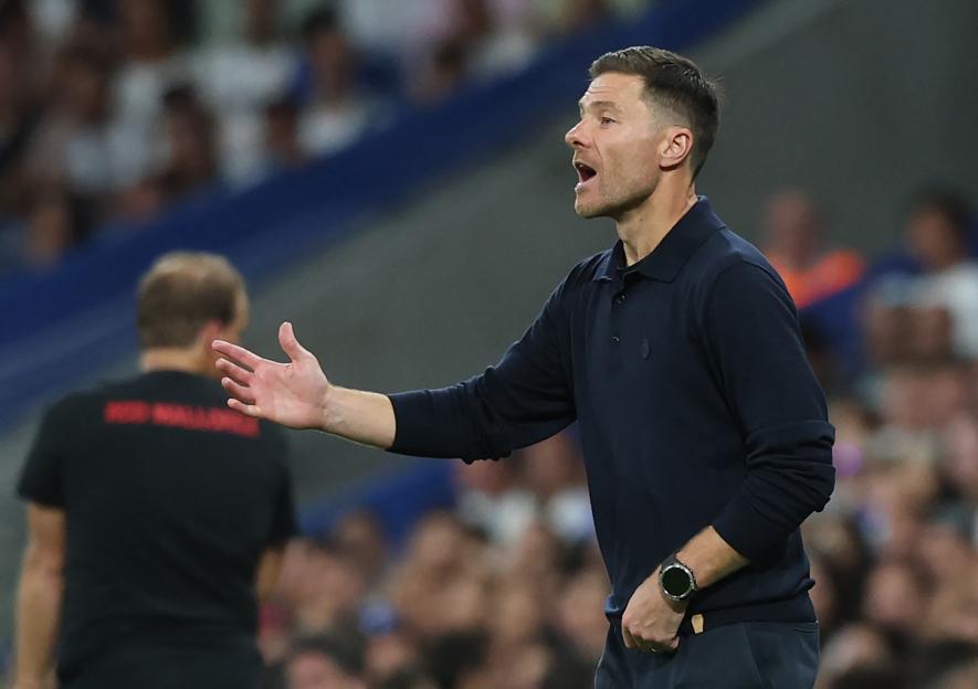 Xabi Alonso, Real Madrid's coach, coaching during a match.