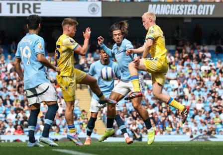 MANCHESTER, ENGLAND - APRIL 12: Manchester City's Jack Grealish battles for possession with Crystal Palace's Will Hughes and Justin Devenny during the Premier League match between Manchester City FC and Crystal Palace FC at Etihad Stadium on April 12, 2025 in Manchester, England. (Photo by Lee Parker - CameraSport via Getty Images)