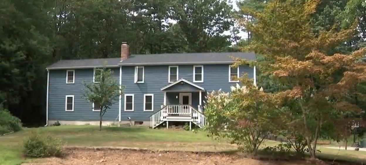 House where a family of four was found dead in a possible murder-suicide.