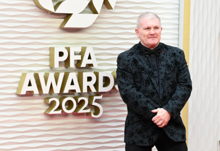 Man in a floral black suit at the PFA Awards 2025.