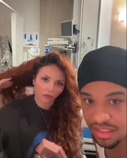 Jesy Nelson and Zion Foster in a hospital room.