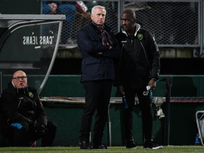 ADO Den Haag coaches Alan Pardew and Chris Powell on the sidelines.