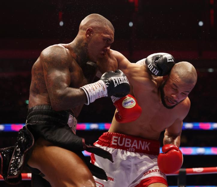Conor Benn punches Chris Eubank Jr. during the Fatal Fury Fight Night.