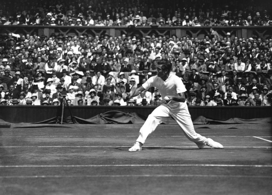 Frank X. Shields playing tennis at Wimbledon.