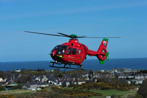Seven hurt in horror three-car crash as casualties fighting for life are flown to hospital and road closed