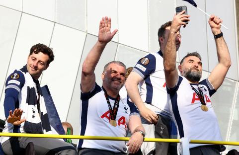 Tottenham Hotspur manager Ange Postecoglou and his assistant coach celebrating a victory.