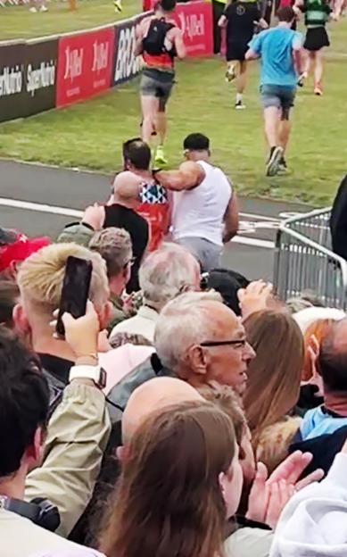 Tommy Fury shoving a rival runner at the Great North Run.