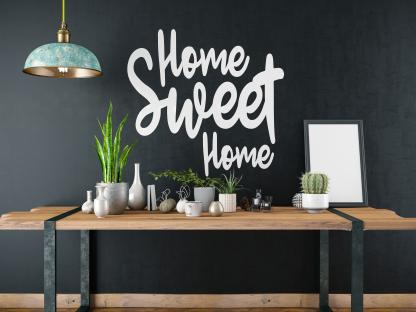 Illustration of a table with plants, home decor, and a