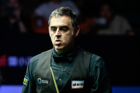 Ronnie O'Sullivan reacting during a snooker semifinal match.