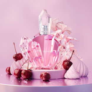 Ariana Grande perfume bottle surrounded by crystals, cherries, and meringues.