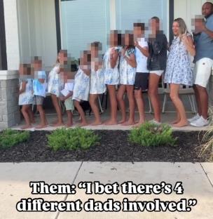 A mother with her eleven children and husband on their porch.