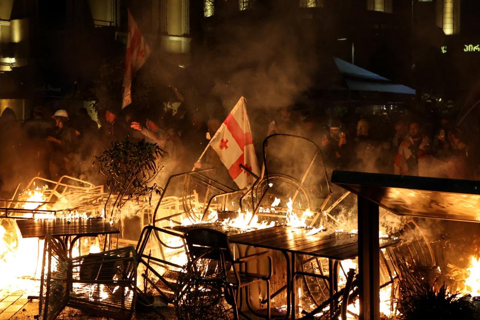 Protesters burn barricades during a rally in Tbilisi.