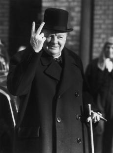 Winston Churchill giving the V for Victory sign.