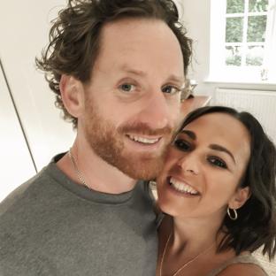 Close-up selfie of a couple.
