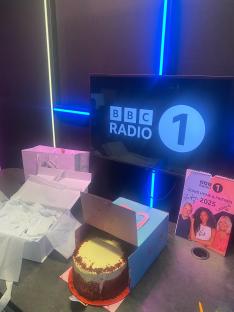 Red velvet cake and gifts for Vick Hope's maternity leave from BBC Radio 1.