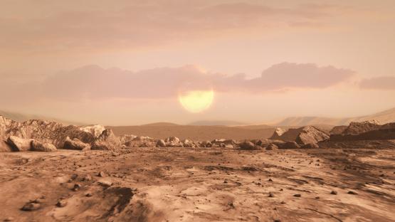 Illustration of a rocky, arid alien planet landscape at sunset.