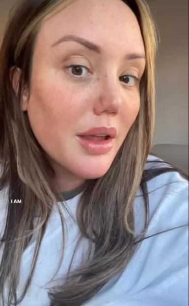 Charlotte Crosby shows off her lip blush tattoo.