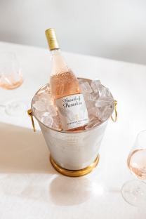 Bottle of Breath of Paradise rosé wine in an ice bucket.