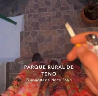 Snapchat image showing legs in patterned pants, a cigarette, and a lighter, with text overlay indicating Parque Rural de Teno, Buenavista del Norte, Spain.