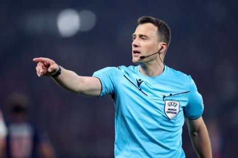 Referee signaling during a soccer match.