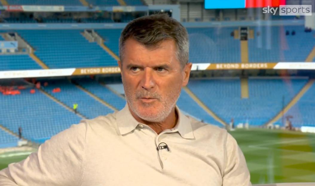 Roy Keane in a Sky Sports interview at a football stadium.