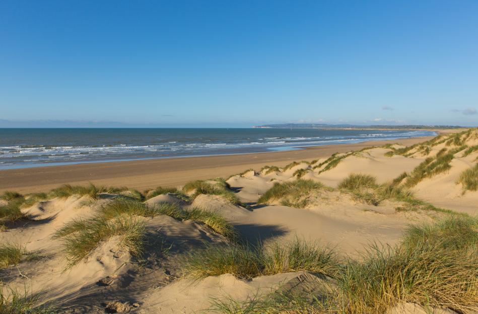Man, 33, charged after woman in her 50s ‘sexually assaulted’ while sunbathing at popular UK beach