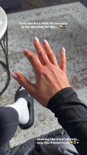 Vicky Pattison's shaky hand with pink nails due to early morning and pre-show nerves.