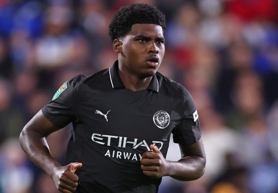 Former England star’s teen sons both make Man City debut in same match in incredible moment for proud dad