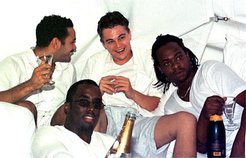 Photo of Leonardo DiCaprio and friends at a party.