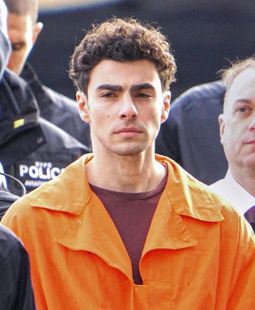 Luigi Mangione, indicted in the murder of UnitedHealthcare CEO Brian Thompson, arriving at the South Street Helipad in New York City.