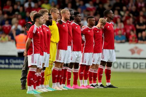 Nottingham Forest players observing a moment of silence.
