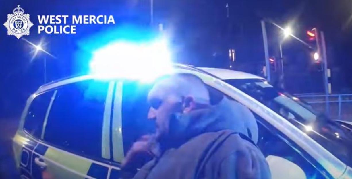 A man being arrested by West Mercia Police.