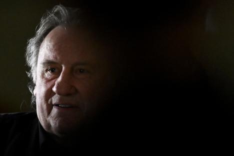 Gerard Depardieu leaving his trial.
