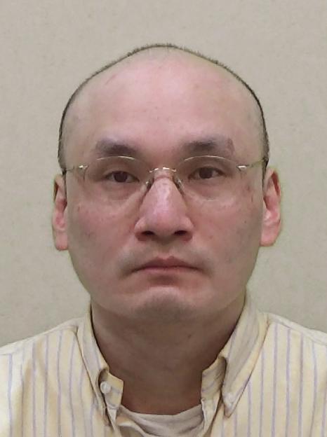 Headshot of Thomas Kwan.