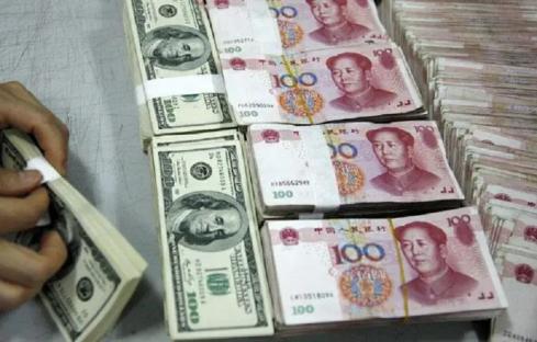 Yuan weakens to 7.2095 against dollar